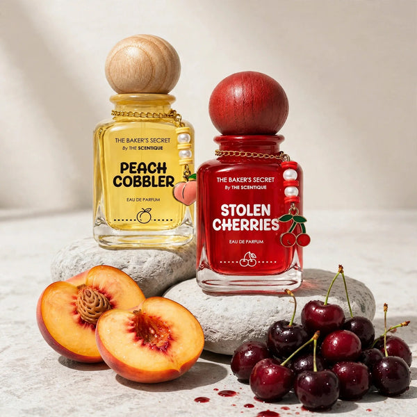 Summer Crush Deal — two bottles on stone with fresh peaches and dark cherries