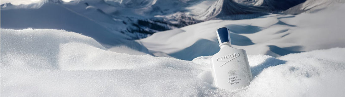 Creed Silver Mountain Water bottle in a snowy alpine landscape — official editorial photo